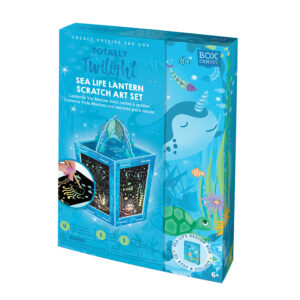 A blue gift box containing the craft supplies need to create a sea life themed light up lantern