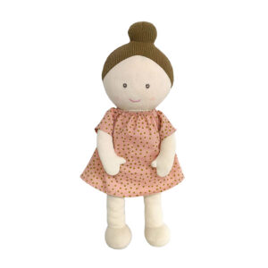 A soft cotton doll dressed in a light pink cotton dress.